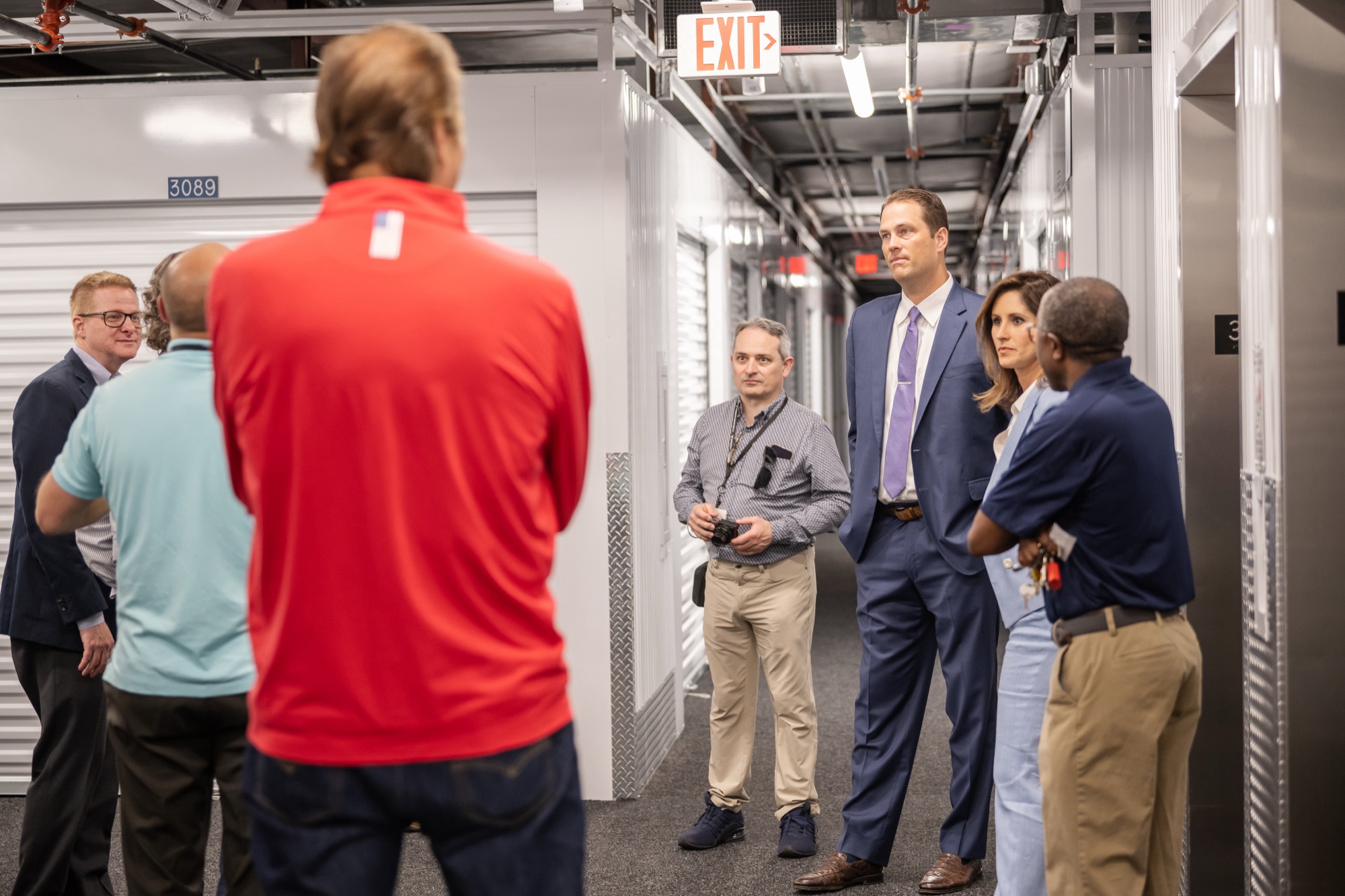 The team walking investors through a self-storage facility